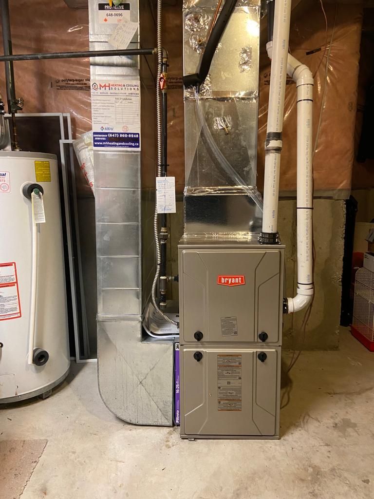 Bryant high-efficiency gas furnace installed in basement
